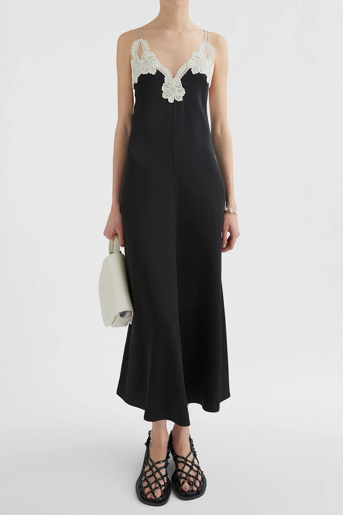 kleid_mit_stickerei_in_sc_1.webp Jil Sander Kleider<Kleid mit Stickerei in Schwarz
